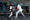 Unitree G1 humanoid robot interacting with a human, showcasing lifelike gestures and real-time responsiveness.